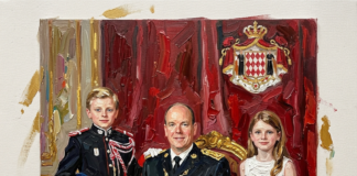 Two Minutes Apart, A World Apart: What Monaco’s Constitution Still Says About Sons and Daughters Prince-Albert-sitting-in-a-gold-chair-inside-palace-of-monaco-with-one-of-his-twin-